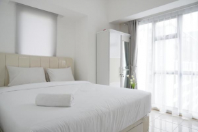 Elegant 1BR Apartment at M-Town Residence near Summarecon Mall By Travelio